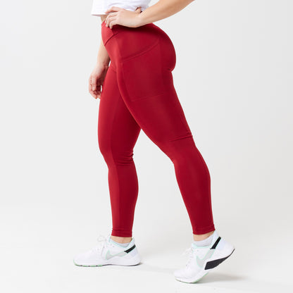 Model wearing red leggings for use in active lifestyles as well as casual living.